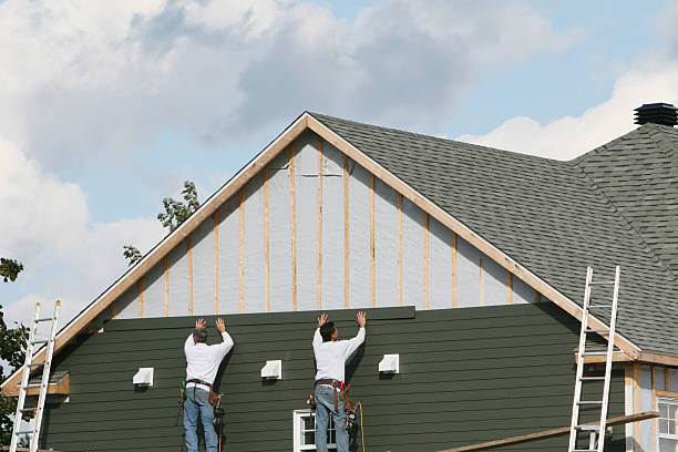 Professional Siding technician working in Aultman, PA